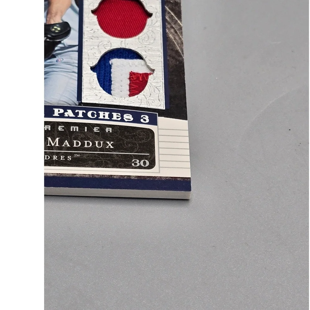 2007 Upper‎ Deck Premier Patches Greg Maddux Triple Relic Jersey 76/87 Padres
